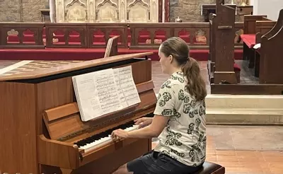Megan Rushbrook at the piano